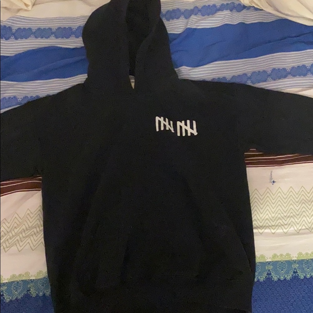This is a black team 10 hoodie